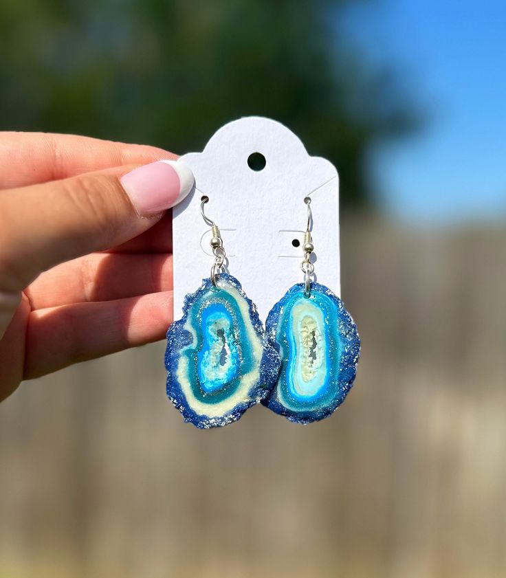 Blue Geode polymer clay earrings handmade with love! Unique Pierced Polymer Clay Earrings, Dangle Resin Earrings, Pierced Dangle Resin Earrings, Turquoise Resin Earrings For Gift, Pierced Dangle Earrings In Resin, Turquoise Polymer Clay Drop Earrings, Handmade Resin Dangle Earrings, Turquoise Dangle Earrings In Polymer Clay, Turquoise Dangle Earrings In Resin