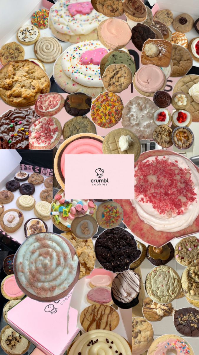 a table topped with lots of different types of cakes and donuts on top of it