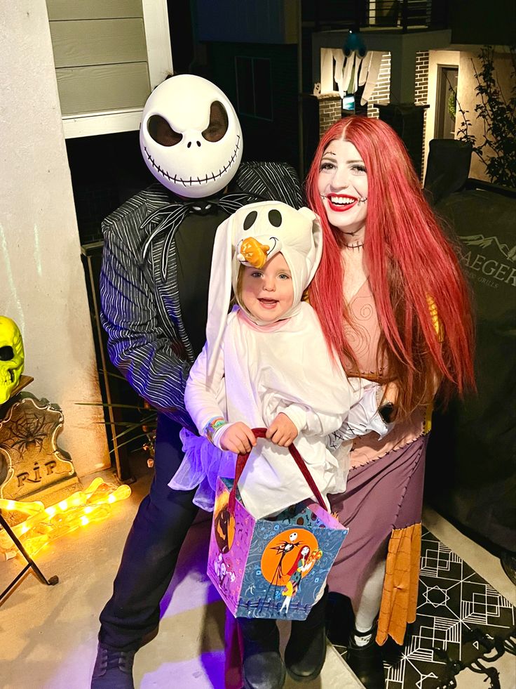 a woman and child dressed up in halloween costumes