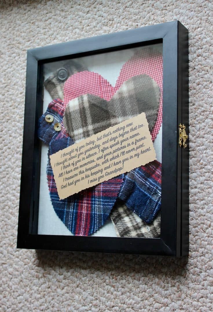 there is a framed photo with some fabric on it