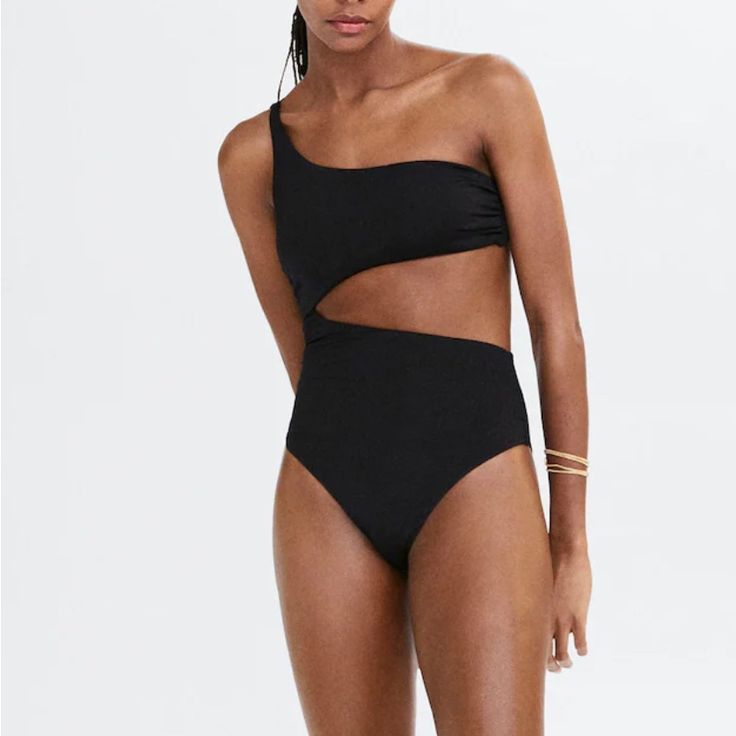 Brand New With Tags And Sanitary Liner Size M Very Flattering Cut Out Bathing Suit Black One-shoulder Cutout Swimwear, Chic Party Swimwear With Asymmetrical Neckline, Black One-shoulder Beachwear Bodysuit, Asymmetrical Cutout Swimwear For Party, Chic Asymmetrical Bodysuit For Beach, Asymmetrical Cutout Party Swimwear, Chic Asymmetrical Solid Swimwear, Black Swimwear With Asymmetrical Neckline For Beach, Chic Black Asymmetrical Swimwear