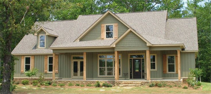 a large house with lots of windows in the front