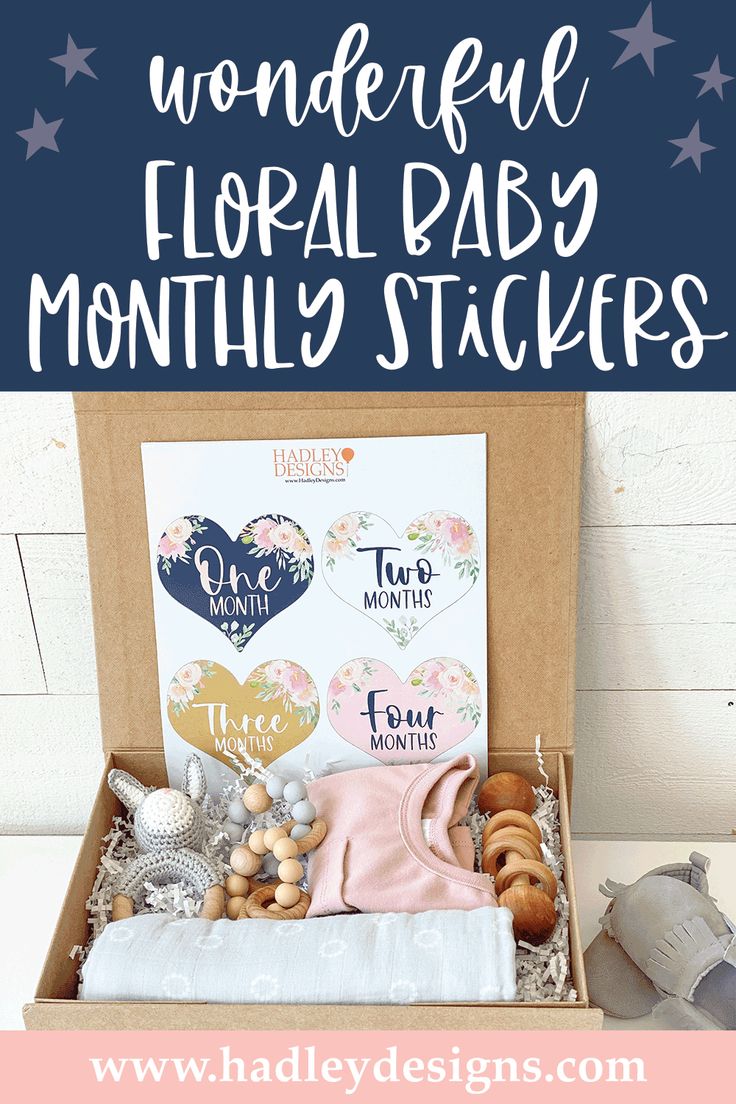 a box filled with baby items and the words wonderful floral baby month stickers in it