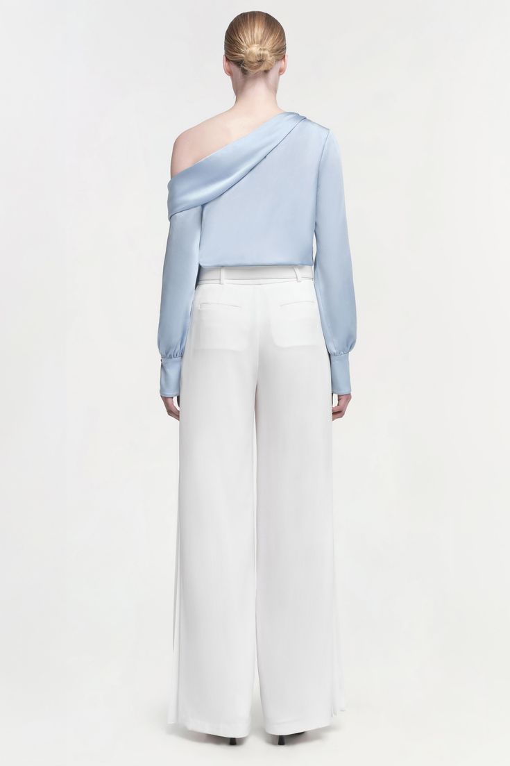 PRE-FALL 2024 WOMEN'S COLLECTION The Alice Top in Sky. Crafted with a delicate drape that cascades elegantly from the shoulder, this top creates a fluid and flattering line across the body. SIMKHAI Women's Alice Top in Sky, Satin, Size Large January Jones, Swim Gifts, One Shoulder Top, Knitwear Tops, One Shoulder Tops, Fall 2024, Pre Fall, British Indian, The Body