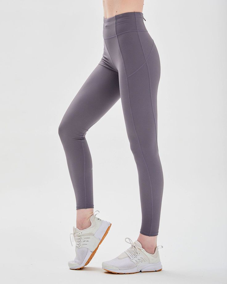 Featuring zip up pockets and stylized seam lines to create an elevated yet stylish performance legging. Our signature Silkiflex™ fabric is 4 way stretch and the ideal support for any workout, from yoga to high intensity cardio. The luxuriously shiny finish wicks away sweat and keeps you cool during your most intense moments. Machine Wash Inseam 27" Model is 5'7" wearing size S Fitted Activewear For Yoga With Functional Pockets, Fitted Yoga Activewear With Functional Pockets, Fitted Athleisure Activewear With Functional Pockets, Fitted Activewear With Functional Pockets For Yoga, Fitted Yoga Pants With Pockets For Sports, Fitted Yoga Pants With Functional Pockets For Sports, Fitted Yoga Pants With Functional Pockets, Fitted Sportswear Activewear With Functional Pockets, Fitted Gym Activewear With Functional Pockets