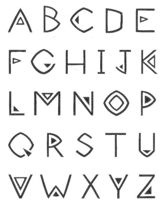 an old english alphabet with the letters and numbers drawn in black ink on white paper