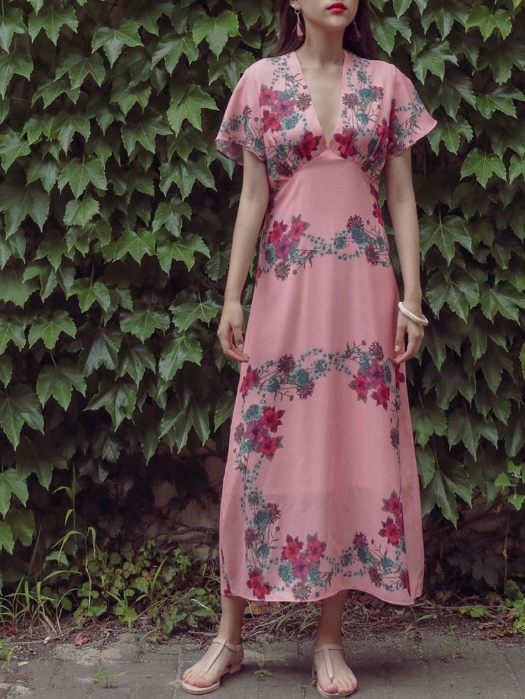 Maxi length V neck dress with short sleeve and pink floral print. Silky satin like material feel. Model is in MINUSEY S. * MINUSEY S = EU 34, US 2* MINUSEY M = EU 36, US 4* 100% Polyester* Dry clean* Made in Korea - Model Height: 170cm/5'7" (US2, EU34) Pink V-neck Midi Dress With Floral Print, Sandro Dress, Chic Pink Floral Print V-neck Dress, Pink Floral Print V-neck Maxi Dress, Floral Print Rayon Maxi Dress With V-neck, Maternity V-neck Maxi Dress With Floral Print, Pink Floral Print, V Neck Dress, Model Height