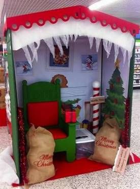 a doll house with furniture and decorations on display in a store or other department building