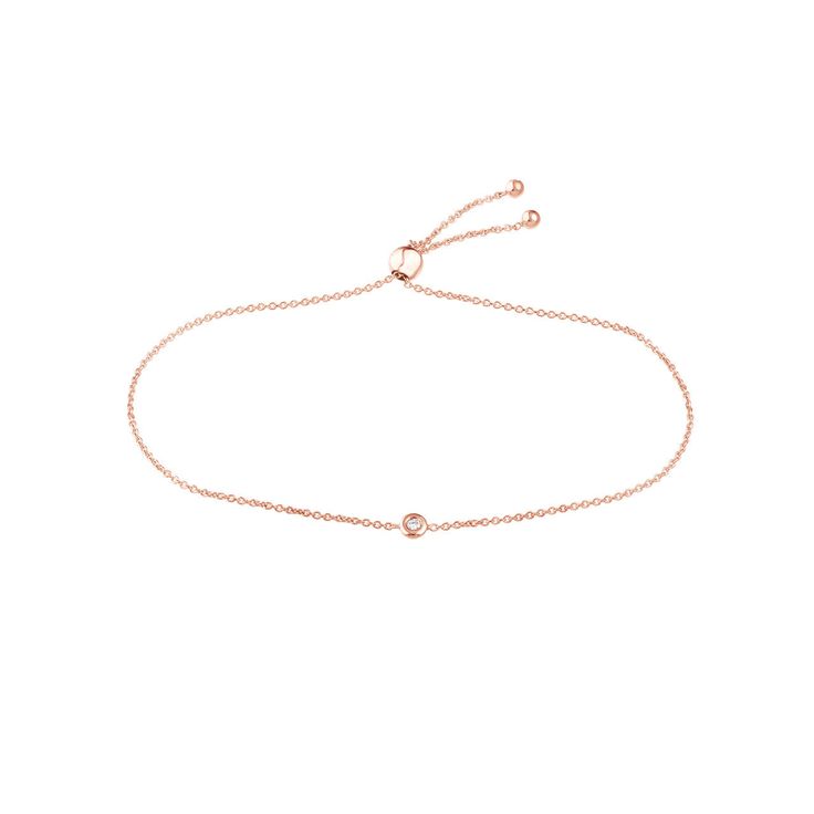 Add a timeless touch to your outfit with a bolo bracelet. Dainty and feminine, this 3.2pt diamond bezel mini bolo will become a favorite! BRACELET INFORMATION SKU: JNCY035400 Metal type 14k Yellow Gold 14k White Gold 14k Rose Gold Color: Yellow, White, Rose Style: Cable Chain Gender: Women Weight (grams): 1.33 Width (mm): 1.05 Length (inches): 9.50 Count (appx): 1 Clasp: Bolo Rhodium Plated: White Gold Only DIAMOND DETAILS Stone Type: Diamond Creation Type: Natural Shape: Round Color: Near Color Adjustable Rose Gold Jewelry With Bezel Setting, Elegant Lariat Jewelry With Sliding Knot, Adjustable Rose Gold Diamond Bracelet, Timeless Adjustable Rose Gold Diamond Bracelet, Adjustable Rose Gold Diamond Bracelet For Everyday, Timeless Adjustable Bracelet With Single Diamond, Elegant Rose Gold Bracelet With Sliding Knot, Adjustable Rose Gold Classic Diamond Bracelet, Adjustable Single Diamond Timeless Jewelry