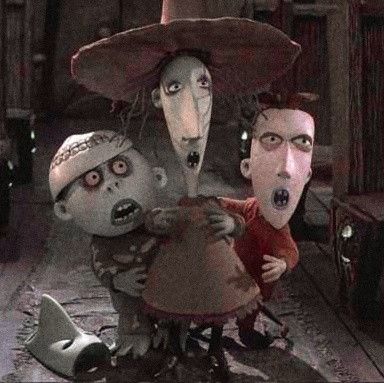 three cartoon characters dressed up as zombies in a living room, one is holding a bag and the other is wearing a hat