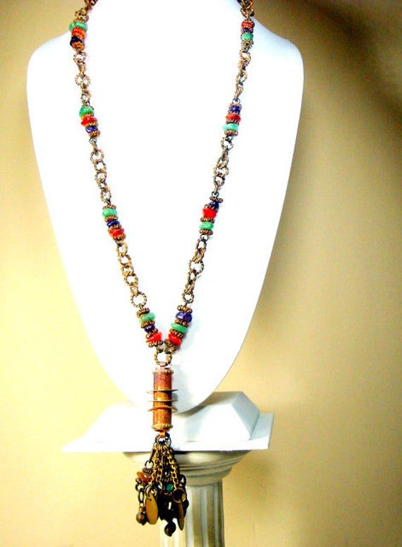 "Lariat Chain Necklace, Tribal India 1960s Coppery Brass w Gemstone Nuggets & Coins, Darkened and Moody From Age Something Old Jewelry, a Primitive Tribal Personal Piece Do not wear on a white shirt The Long coin chain Tassel Necklace is 28\" to the top of the tassel ( 71.12cm ) the Tassel is 4\" long by 2\" wide ( 10.16cm x 5.08cm ) all tarnished from age, ---------------------------------------------------------------------------- PLEASE NOTE I ONLY ship to your paid ETSY invoice address, Vintage Beaded Chain Pendant Jewelry, Bohemian Long Necklace For Jewelry Making With Dangling Beads, Bohemian Chain Necklace With Round Beads And Adjustable Chain, Vintage Beaded Pendant Jewelry, Vintage Multicolor Jewelry For Jewelry Making, Bohemian Chain Necklace With Round Beads, Adjustable Beaded Bohemian Chain Necklace, Bohemian Lariat Chain Jewelry, Handmade Adjustable Vintage Chain Necklace