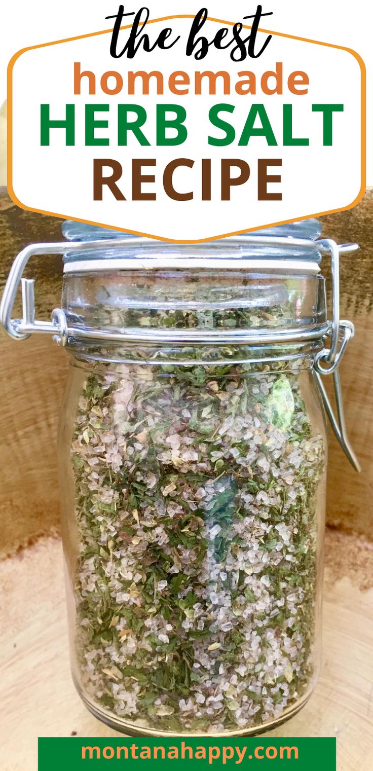 homemade herb salt in a glass jar on top of a tree stump with text overlay