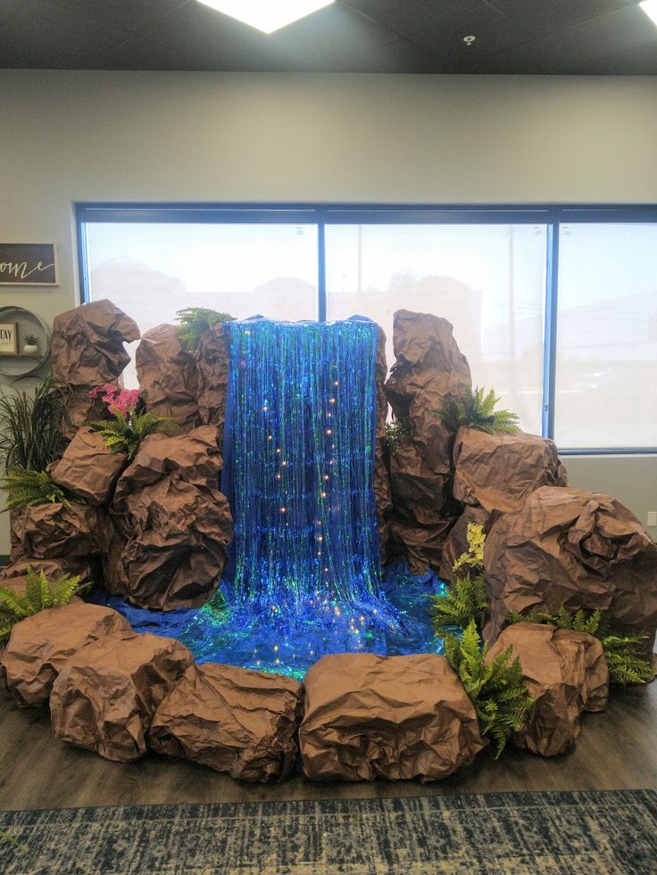 Calvary Chapel Santa Fe Springs VBS Waterfall Decoration, Diy Waterfall, Jungle Decorations, Ganpati Decoration At Home, Ganapati Decoration, Deco Jungle, Luau Theme Party, Decoration For Ganpati, Vbs Themes