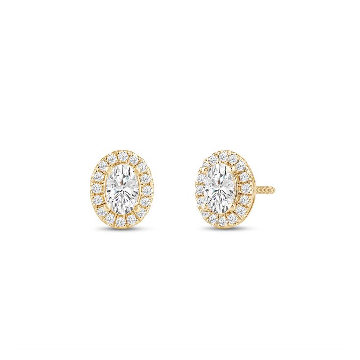 Classic oval cut earrings with a stunning halo of round stones encircling the center stone.A lovely outfit-maker, this pair of stud earrings is what you need to give any ensemble a polished, put-together finish Diamond White Oval Halo Diamond Earrings, Timeless Oval Diamond Earrings With Accents, Timeless Oval Yellow Gold Diamond Earrings, Diamond White Oval Halo Earrings, Timeless Oval Diamond Earrings, Oval Diamond Earrings With Halo Setting For Anniversary, White Oval Diamond Earrings With Halo Design, Oval Diamond White Earrings With Halo Setting, Oval Diamond White Halo Earrings