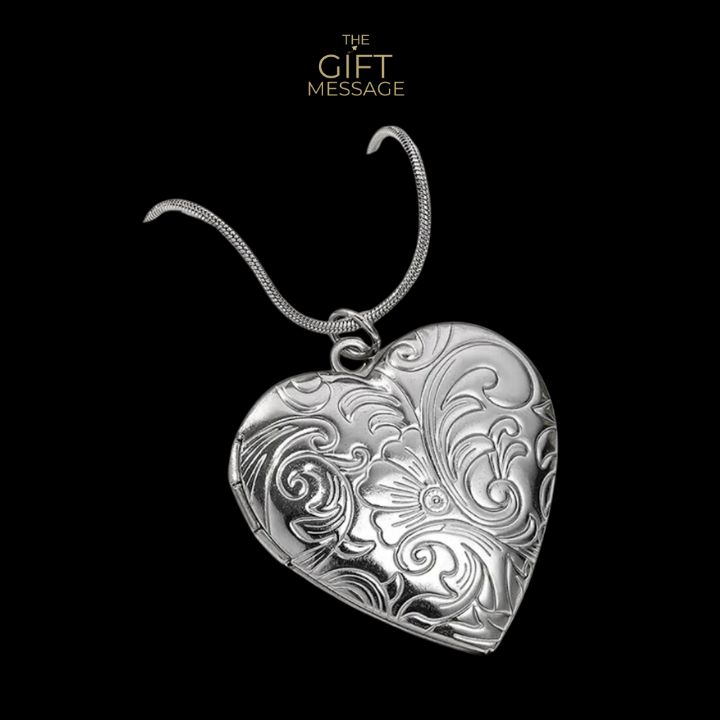 Tulipa, is for the big loves. It is a beautiful, art deco inspied engraved heart locket, that opens to frame a photo or other. Tulipa comes with a chain of 45cm with an extender of 5cm Size of locket is 3.1cm high and 2.8cm wide. Material: Stainless Steel Luxury Silver Heart Necklace Gift, Luxury Memorial Locket Jewelry, Luxury Keepsake Medallion Necklace, Luxury Oval Pendant Locket Necklace As Gift, Heirloom Engraved Locket Necklace For Valentine's Day, Vintage Necklace With Engraving Option For Keepsake, Classic Heart Pendant Necklace For Gift, Valentine's Day Medallion Locket Jewelry, Elegant Personalized Medallion Heart Necklace