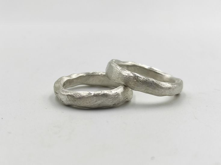 Organic silver band ring.  A thick irregular silver band that can be worn alone or two together also can be combined with others as a stacking ring. It is made of solid 925 silver with a rough finish. It is a simple ring suitable for your everyday casual outfit. It's so simple and yet so special and elegant! Αs each piece is individually handmade, slight variations in texture are possible. DESCRIPTIONS and MEASUREMENTS Material   : Sterling silver. Thickness 0,5 (cm) 0,20 (in") thinnest point to Edgy Jewelry, Hammered Ring, Stackable Bands, Hammered Rings, Simple Ring, Silver Band Ring, One Ring, Rings Simple, Stacking Ring