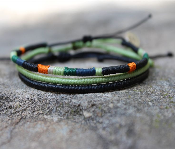 1 multicolor wrap bracelet  1 black wrap bracelet 1 green wrap bracelet Adjustable Green Bohemian Braided Bracelets For Everyday, Everyday Green Bohemian Braided Bracelets, Minimalist Adjustable Green Friendship Bracelets, Adjustable Green Bracelets For Festival, Adjustable Green Bracelet For Festival, Trendy Green Braided Bracelet For Everyday, Casual Black Hand Wrapped Braided Bracelets, Trendy Green Braided Bracelet, Casual Black Hand Wrapped Braided Bracelet