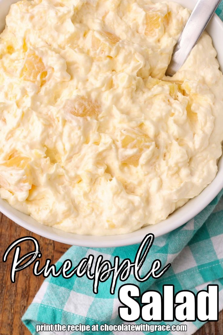 a white bowl filled with mashed potatoes on top of a blue and white checkered towel