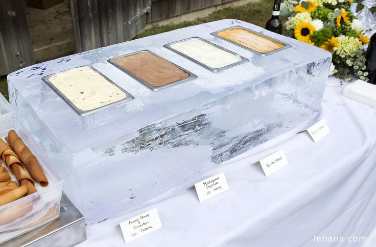 an ice box filled with lots of different types of food on top of a table