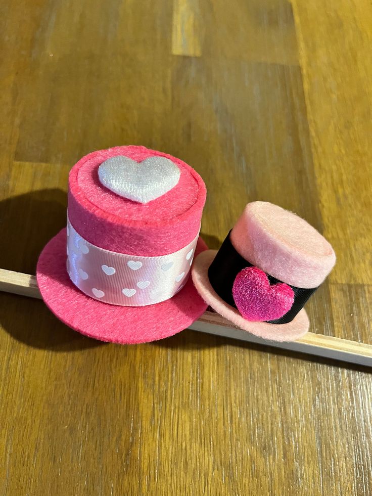 Set of 2 valentines top hats. Cute Pink Mini Hat As A Gift, Playful Pink Mini Hats For Gifts, Playful Pink Mini Hat Gift, Pink Brimmed Hat For Gift, Pink Cap Mini Hat As Gift, Cute Mini Hats With Curved Brim As Gifts, Cute Brimmed Hat For Gift, Cute Brimmed Hat As Gift, Cute Brimmed Hat As A Gift