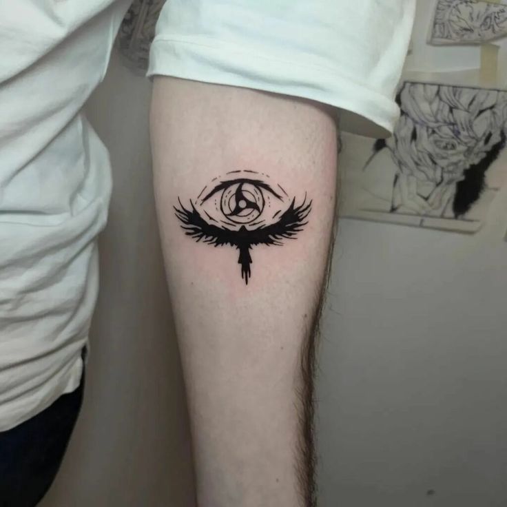 a person with a tattoo on their leg that has an all seeing eye in it