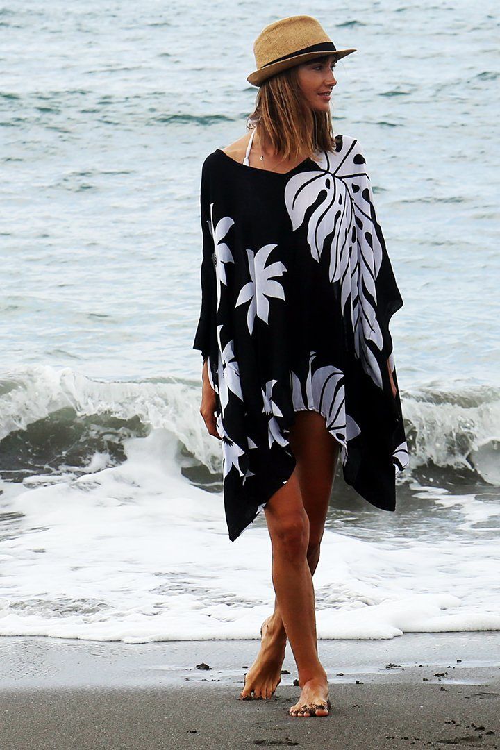 Having a stylish beach cover up is a must! The beautifully printed tunic beach cover up creates a vibrant look. Easy to pull on and easy to pack. Making clothes for the traveling woman. Boho design Lightweight beach dress Semi-Sheer Hand wash in cold water, hang to dry Floral Beach Dresses, Short Poncho, Floral Beach Dress, Womens Beach Dresses, Dress Swimwear, Poncho Dress, Kaftan Top, Swimsuit Cover Up Dress, Dress Kaftan