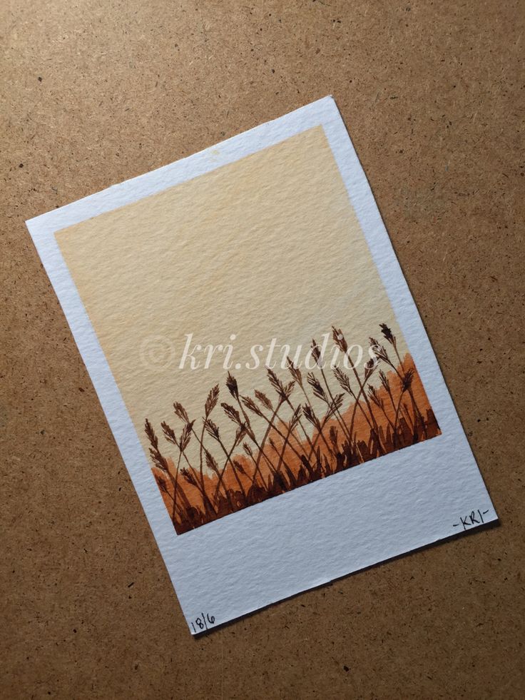 a card with the words kris stinse on it in front of a brown background