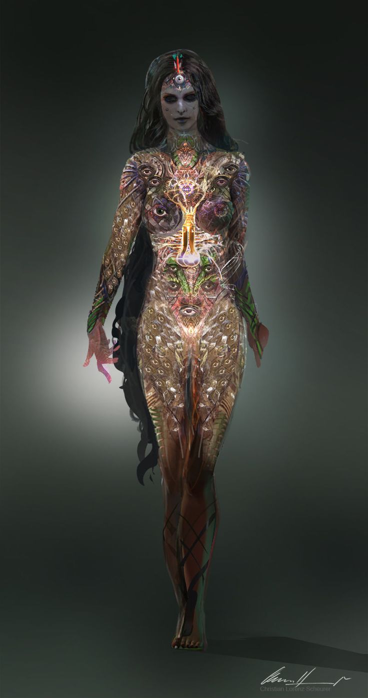 a woman in a body suit with an elaborate headpiece