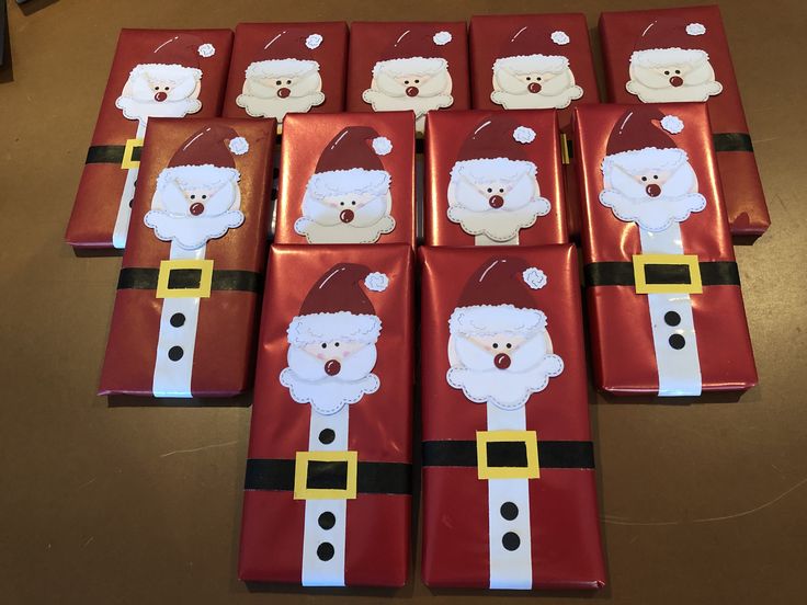 santa clause chocolates are arranged on top of each other