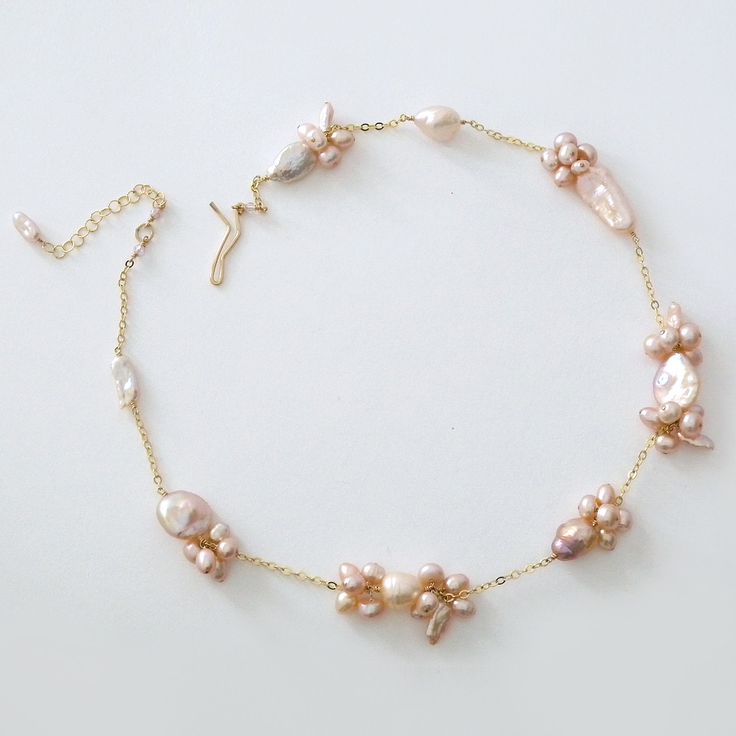 Delisch Designer Jewelry, Organic Blush PInk Pearl Necklace, Freshwater, Keishi & round pearls are scattered along a gold link chain. Wear layered or solo, dressed up or down for unique style. Delicate Single Strand Pink Necklace, Delicate Pink Single Strand Necklace, Pink Clavicle Chain Jewelry For Wedding, Elegant Adjustable Pink Gold Necklace, Elegant Pink Gold Adjustable Necklace, Pink Pearl Jewelry With Pearl Chain, Adjustable Pink Pearl Chain Jewelry, Pink Pearl Chain Necklace For Wedding, Pink Pearl Chain Jewelry For Wedding