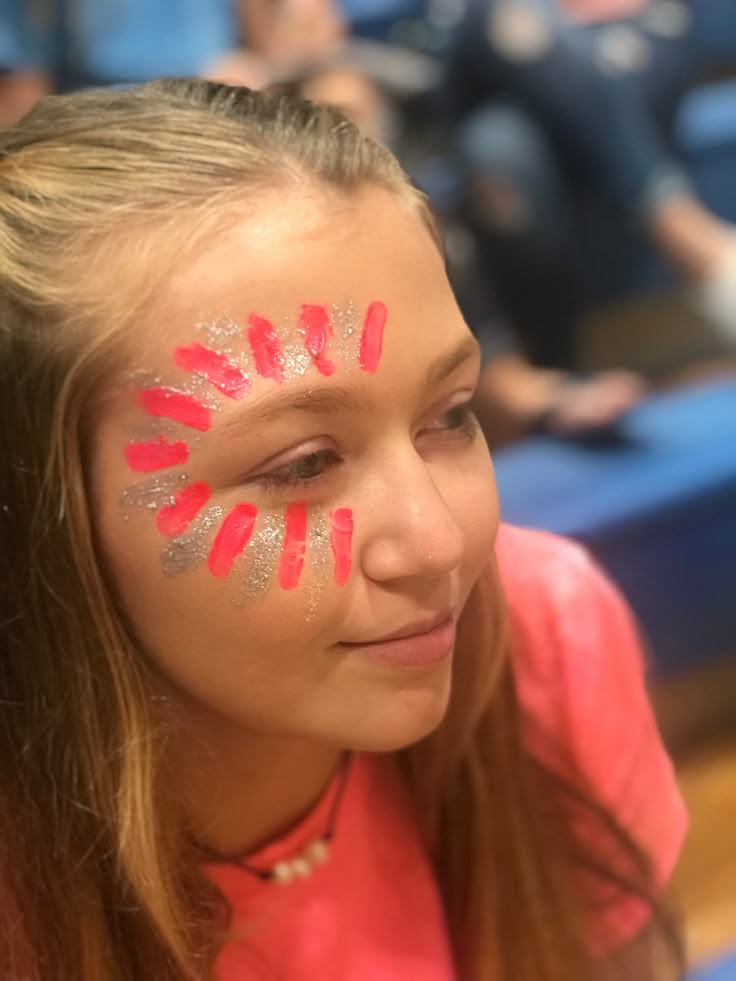 Game Day Face Paint, Spirit Face Paint, School Spirit Face Paint, Game Face Paint, Glitter Station, Festival Henna, Football Face Paint, Football Makeup, Neon Face Paint