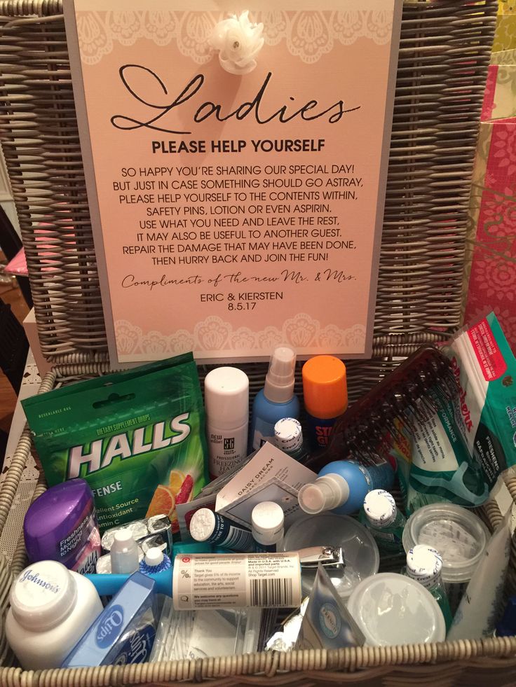 a basket filled with personal care items next to a sign