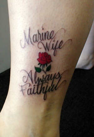 a woman's foot with the words marine wife and always beautiful on it