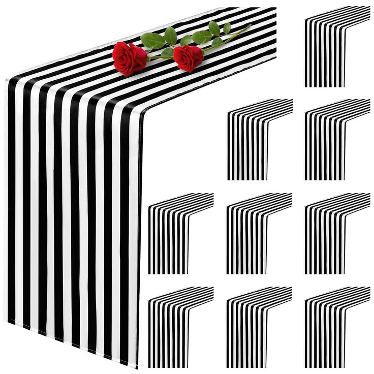 several black and white striped boxes with roses on them, all lined up in rows