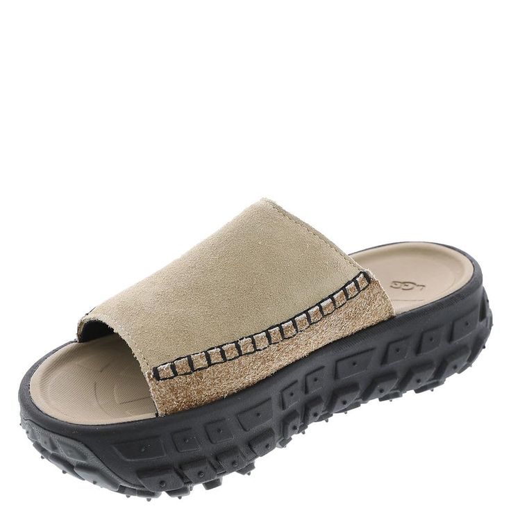 PRICES MAY VARY. Suede upper Textile lining made from 100% recycled polyester fibers Sugarcane EVA footbed Rubber outsole Sugarcane EVA midsole Comfortable Slip-on Sandals With Textured Sole, Beige Non-slip Synthetic Sandals, Synthetic Slip-on Slippers With Textured Sole, Non-slip Synthetic Slippers For Outdoor Use, Outdoor Non-slip Synthetic Slippers, Beige Synthetic Slides With Round Toe, Beige Round Toe Synthetic Slides, Lightweight Non-slip Slip-on Slides, Slip-on Synthetic Slippers With Textured Sole