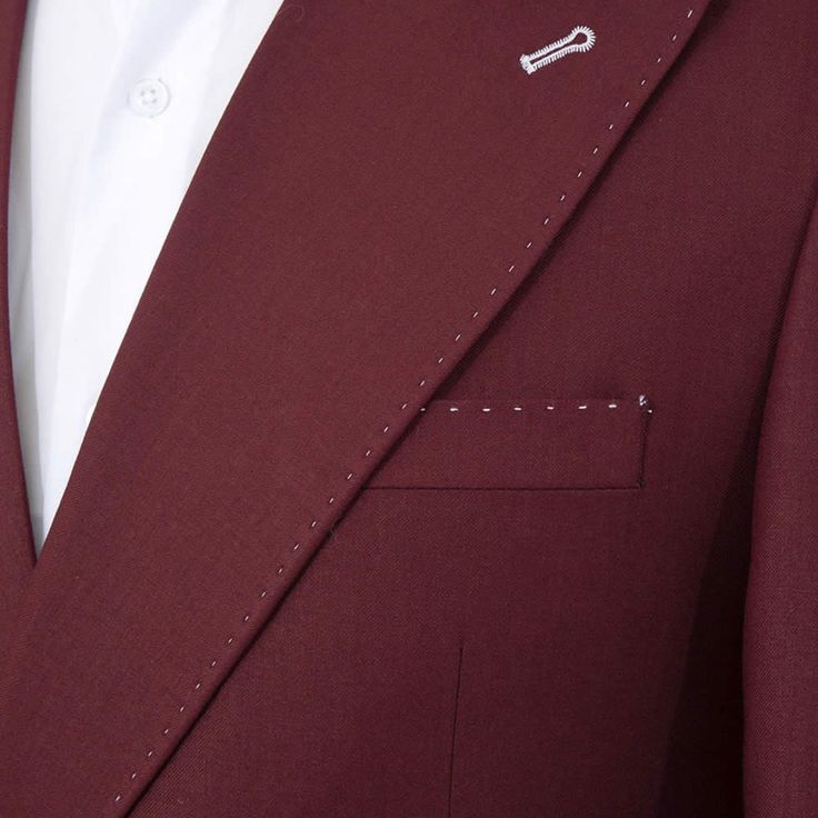 Package Includes: 1 x Jacket - 1 x Pant

Experience sophisticated style with Andre Emilio's Burgundy Double Breasted Suit, featuring meticulous pick stitch detailing and elegant white buttons. Shop now for free shipping on all orders. Transform your wardrobe and make a lasting impression.

 	Fabric: 100% Wool
 	Yarn: 120s
 	Lining Fabric: Silk
 	Pattern: Solid
 	Buttons: White Brass
 	Construction: Half Canvas
 	Seasonality: All Season
 	Jacket: Peak Lapel, 2 Flap Pockets, Double Breasted Closur Luxury Single Breasted Workwear Set, Designer Suits With Hidden Button Closure, Designer Fitted Suit With Double Button Closure, Designer Suits With Double Button Closure, Luxury Single-button Sets With Notch Lapel, Semi-formal Tuxedo Set With Buttons, Designer Single Breasted Suit With Notch Lapel, Three-piece Tuxedo Suit With Notch Lapel, Single Breasted Suiting Fabric Sets For Tailoring