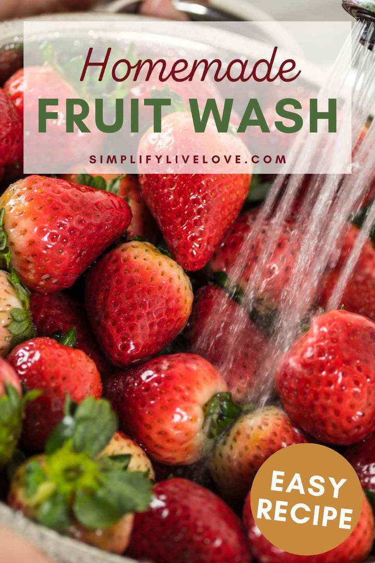 strawberries are being washed in a bowl with the words homemade fruit wash on it