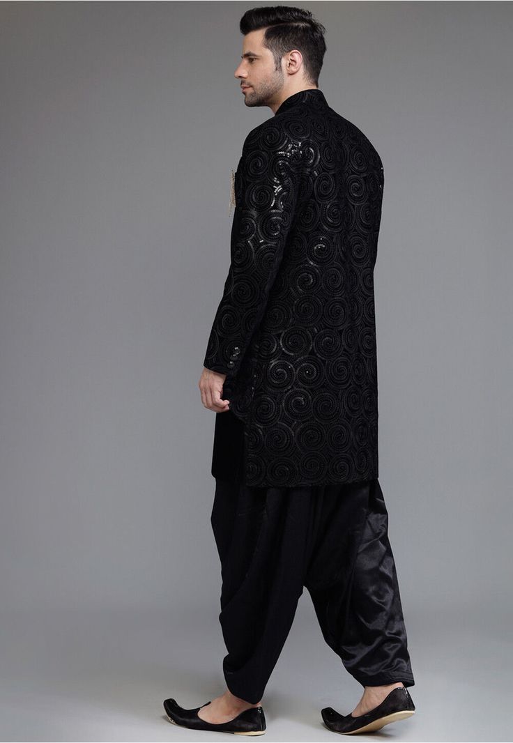 Black Sherwani With Mirror Work, Black Bandhgala With Chikankari Embroidery Bollywood Style, Black Straight Kurta Sherwani For Navratri, Black Sherwani With Mirror Work For Diwali, Black Nehru Jacket With Zari Work, Black Sherwani With Chikankari Embroidery For Festivals, Black Long Sleeve Sherwani For Navratri, Black Sherwani With Mirror Work For Festivals, Festival Black Sherwani With Mirror Work