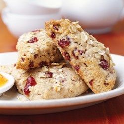 some oatmeal cookies are in a white bowl