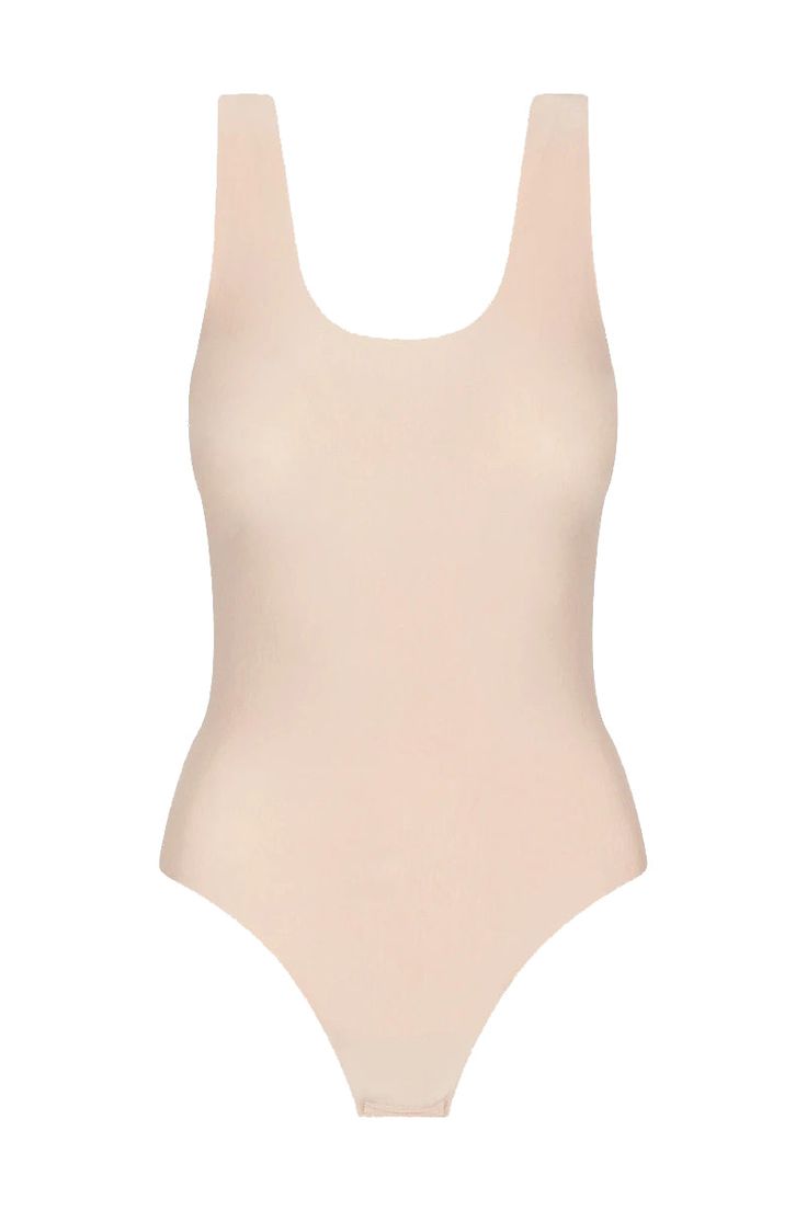 Description This Butter Tank Bodysuit features next-level softness and supreme stretch from European modal. It features an ultra-flattering fit and is finished with a raw-cut thong bottom. All About the Fit Fabric Feel (light) 1 2 3 4 (heavy) Fit (slimfit) 1 2 3 4 (loosefit) Fabric Details: Luxury Austrian modal blend (79% modal, 21% elastane) Fit-tested by real women Elastic-free construction Four way stretch and high recovery Pilling resistant Raw-cut edges Snap gusset closure Machine washable Second-skin Elastane Bodysuit For Loungewear, Seamless Second-skin Bodysuit For Loungewear, Smoothing Bodysuit For Loungewear, Smoothing Bodysuit With Minimal Stretch For Loungewear, Elegant Seamless Bodysuit For Loungewear, Seamless Soft Stretch Bodysuit, Fitted Elastane Swimwear With Soft Touch, Elegant Elastane Bodysuit For Loungewear, Fitted Soft Touch Swimwear For Summer