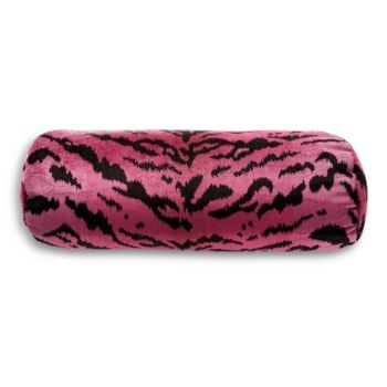 a pink and black animal print pillow on a white background