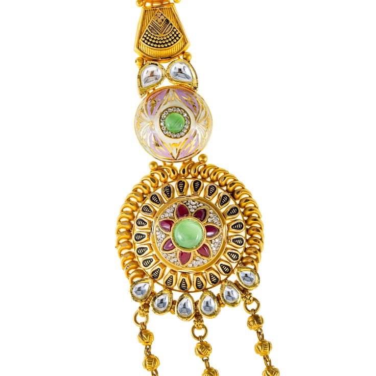 Virani Jewelers presents a 22k yellow gold necklace and earring set that captures the essence of traditional Indian jewelry. The vibrant rubies, emeralds, and Kundan stones are beautifully framed in intricate 22k gold designs. The radiant details gives the set a vintage charm, perfect for those who appreciate timeless beauty. Whether worn for cultural festivities or formal events, this 22k gold Kundan and gemstone necklace set offers a stunning combination of opulence and heritage craftsmanship.Features• 22k yellow gold• Engraved details• Emerald • Kundan • RubyNecklace Specifications:• Minimum Width - 2.5 millimeters• Maximum Width - 48.75 millimeters• Length - 28 inchesEarring Specifications:• Minimum Width - 1.5 millimeters• Maximum Width - 25.25 millimeters• Length - 2.25 inches• This Luxury Meenakari Kundan Necklace For Ceremonial Occasions, Luxury Chandbali Kundan Necklace For Puja, Luxury Kundan Necklace With Meenakari And Ruby, Luxury Kundan Meenakari Necklace With Ruby, Luxury Meenakari Chandbalis For Designer Wear, Luxury Yellow Gold Kundan Necklace With Meenakari, Luxury Kundan Meenakari Danglers, Luxury Gold Meenakari Chandbalis, Necklace Kameswari Jewellers