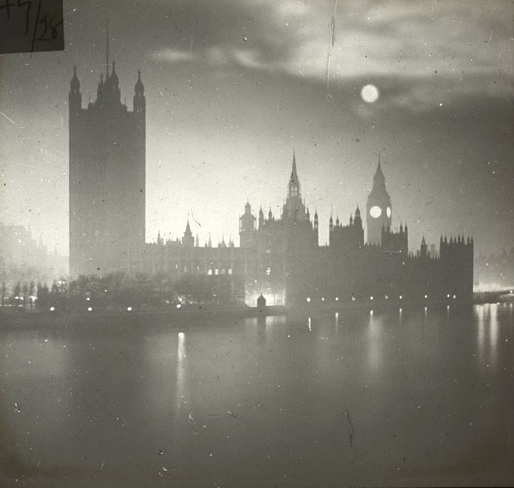 the big ben clock tower towering over the city of london, england at night time