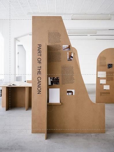 an open book shelf sitting on top of a floor