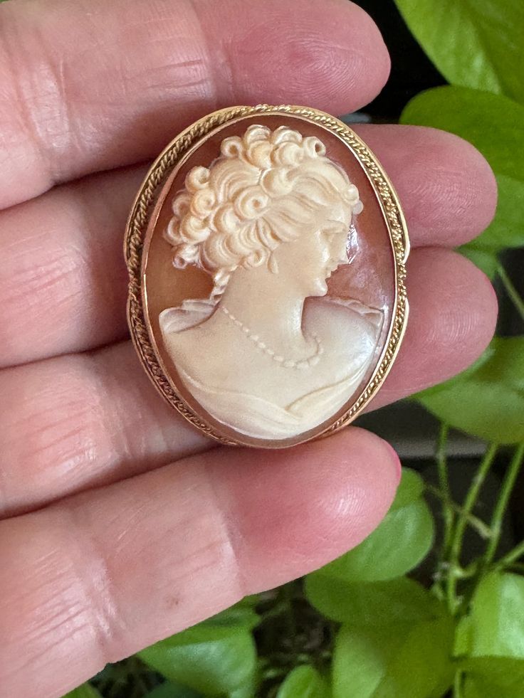 "Stunning 14K gold petite Cameo Pin and Pendant.  Has a fold down bale so you can wear this as a brooch or pendant.  1.50\" High with out bale x 1.20\" wide Hallmarked both on the pin back and the frame 14K gold Package will ship priority Mail Insured.  For more items click on :  http://www.etsy.com/shop/MISSIONMOD?ref=pr_shop_more  **ALL METALS AND STONES ARE TESTED TO BE SUCH,BUY WITH CONFIDENCE THAT HERE AT MISSION*MOD WE STRIVE TO BRING YOU THE BEST WE CAN FIND...RANGING FROM VINTAGE TO ANTI Jewelry Clothing, Antique Clothing, Pin Backs, Pin Brooch, Priority Mail, Antique Jewelry, Brooch Pin, Vintage Antiques, Jewelry Necklace Pendant