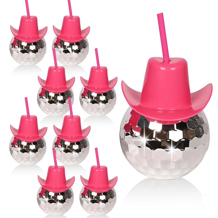 a set of six shiny disco balls with pink cowboy hats on top and one in the middle