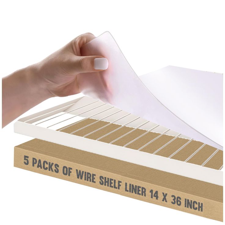 a hand holding a piece of paper over a box with the label 5 packs of wire shelf liners