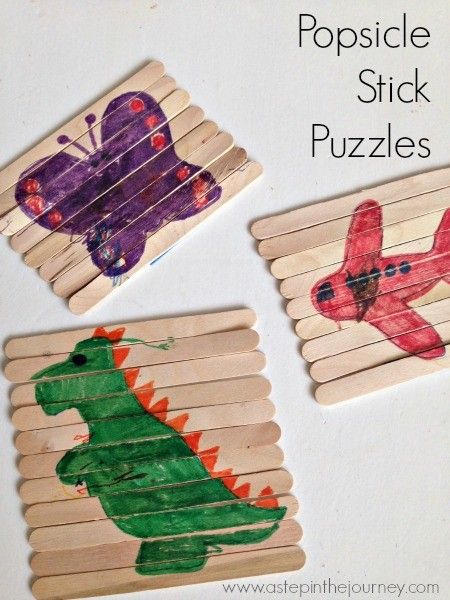 popsicle stick crafts for kids with pictures of dinosaurs and an airplane on the top