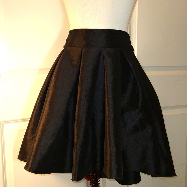 Black Taffeta Skirt By Vertiche Excellent Unused Condition Super Cute And Elegant. Ties Around The Waist Zipper In Back Full Skirt With Pleats. Hand Washable. S429i Black A-line Voluminous Skirt, Chic A-line Skirt For Party, Elegant A-line Mini Skirt For Evening, Pleated A-line Mini Skirt For Night Out, Elegant Solid Color Party Skirt, Elegant Ruffled Mini Skirt For Formal Occasions, Elegant Formal Mini Pleated Skirt, Cocktail Flared Pleated Mini Skirt, Black Pleated A-line Mini Skirt