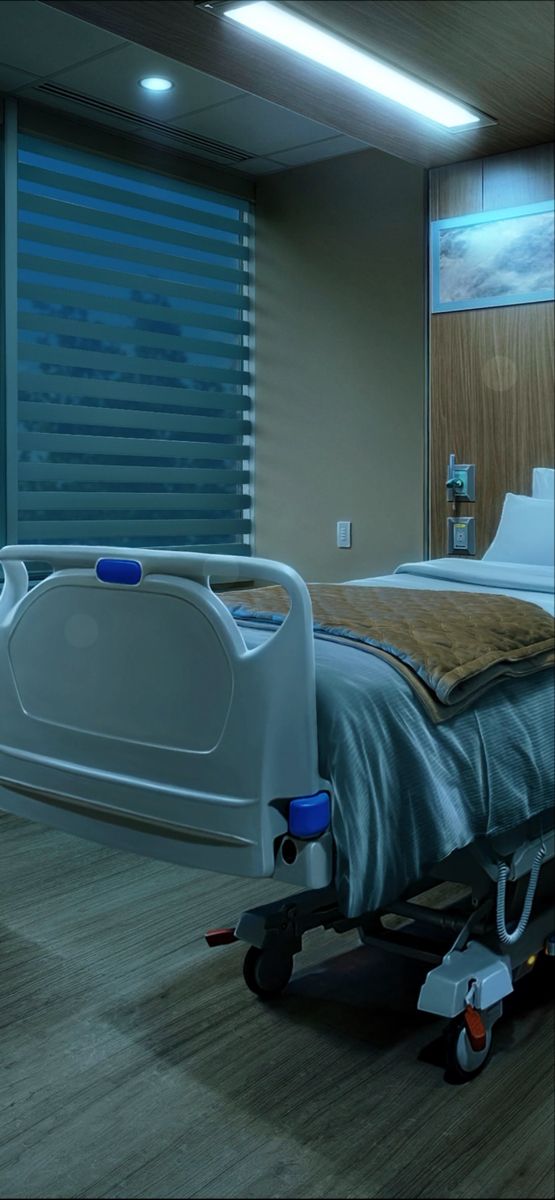 a hospital bed with wheels on the floor